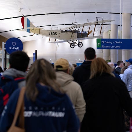 Travellers wait in Transportation Security Administration screening lines at the San Antonio International Airport in San Antonio, Texas, U.S., March 14, 2026. REUTERS/Kaylee Greenlee
