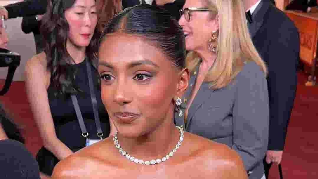 'Bridgerton' star Charithra Chandran dons red pin at the Oscars