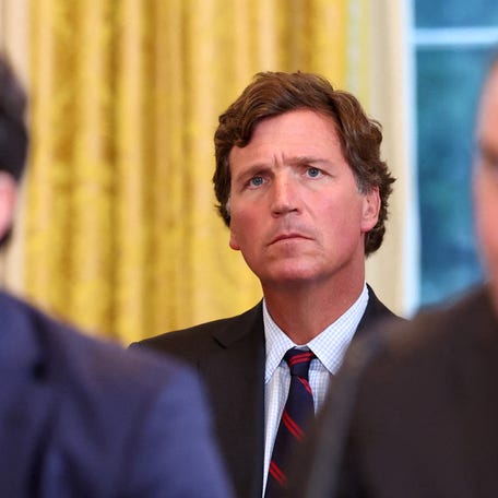 Tucker Carlson looks on during President Donald Trump's meeting with oil industry executives at the White House in Washington, DC, on Jan. 9, 2026.