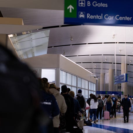 Travelers wait in Transportation Security Administration screening lines at the San Antonio International Airport in San Antonio, Texas, U.S., March 14, 2026.
