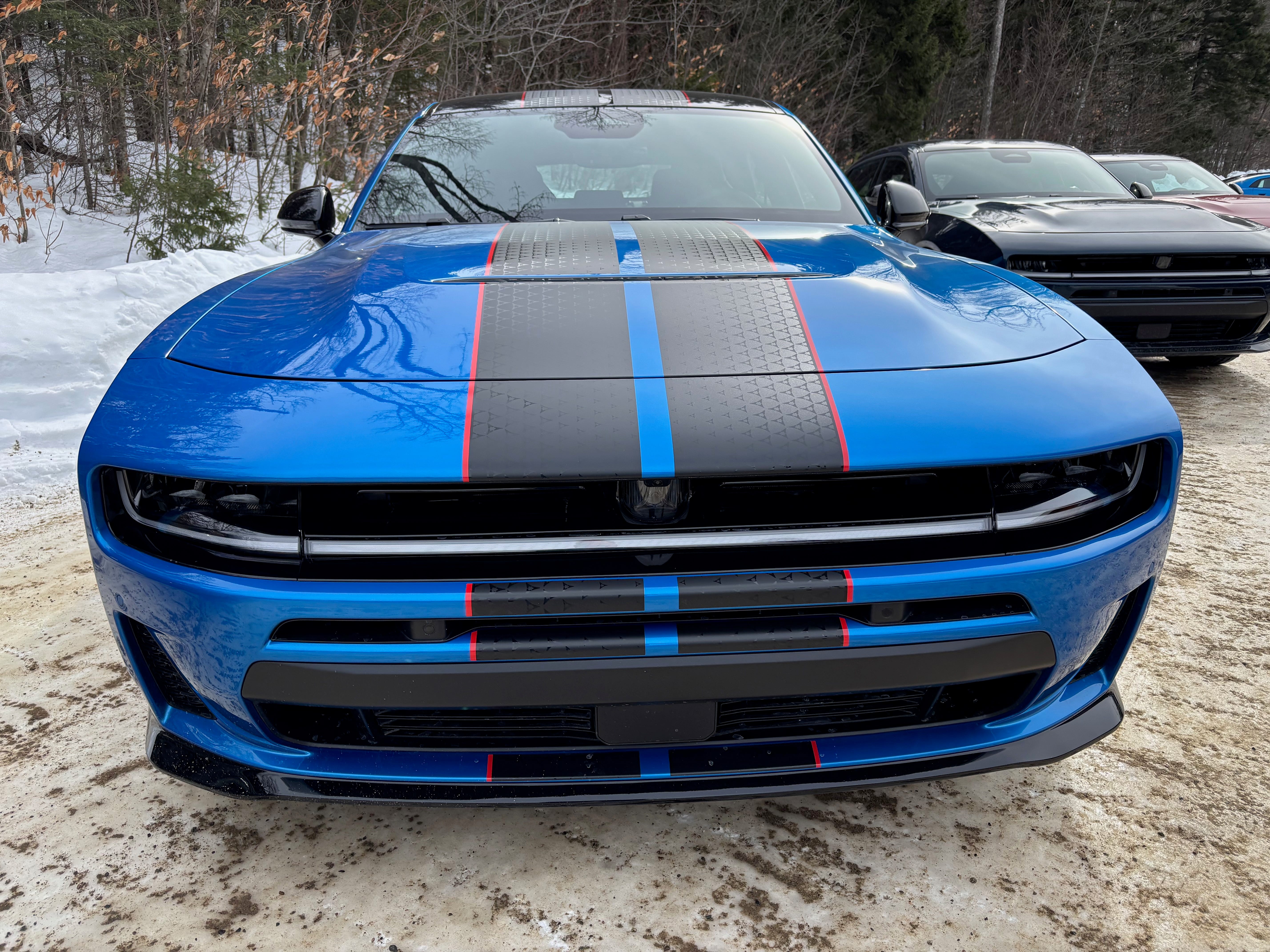 https://www.gannett-cdn.com/authoring/authoring-images/2026/03/18/PDTF/89203857007-2026-dodge-charger-rt-still-2.jpeg?auto=webp&crop=5711,3213,x0,y535&format=pjpg&width=1200