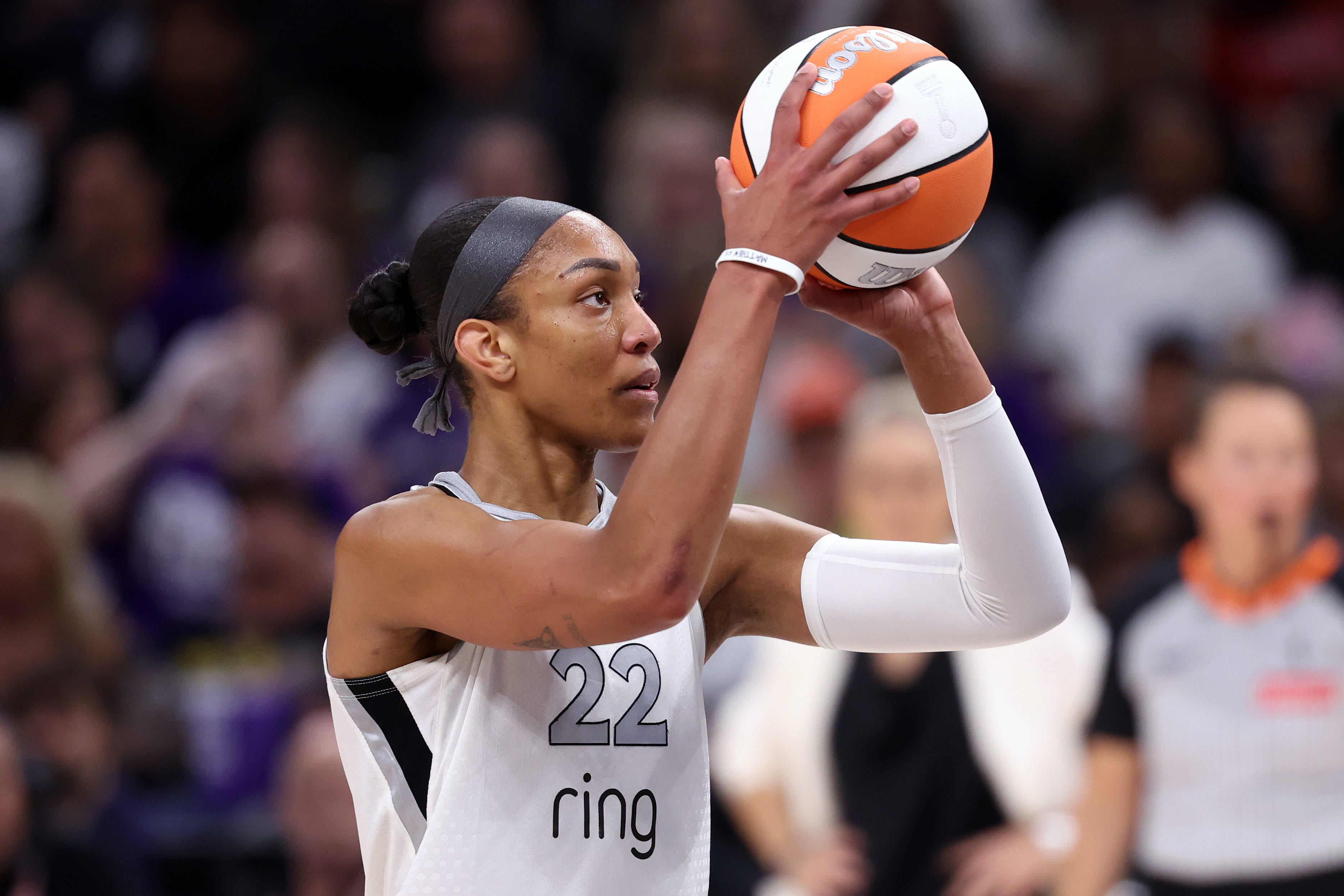 Four-time MVP A'ja Wilson has signed the richest contract in WNBA history at $5 million guaranteed over three years to remain with the Las Vegas Aces.