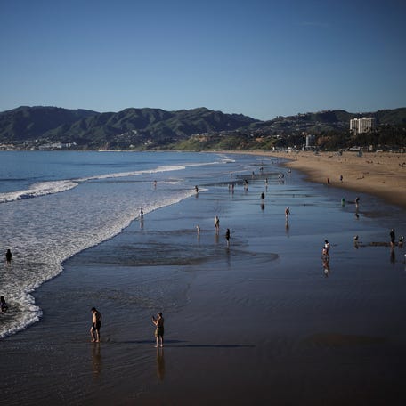 People are pictured enjoying the beach in Santa Monica, California, on Jan. 15, 2026.