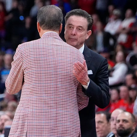 Mar 22, 2025; Providence, RI, USA; St. John's Red Storm head coach Rick Pitino and Arkansas Razorbacks head coach John Calipari shake hands as the Razorbacks won a second round men's NCAA Tournament game at Amica Mutual Pavilion. Mandatory Credit: Gregory Fisher-Imagn Images