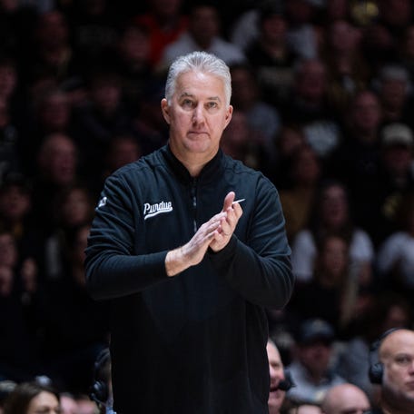 Purdue Boilermakers head coach Matt Painter claps his hands after a foul is called during the first half against the Illinois Fighting Illini at Mackey Arena.
