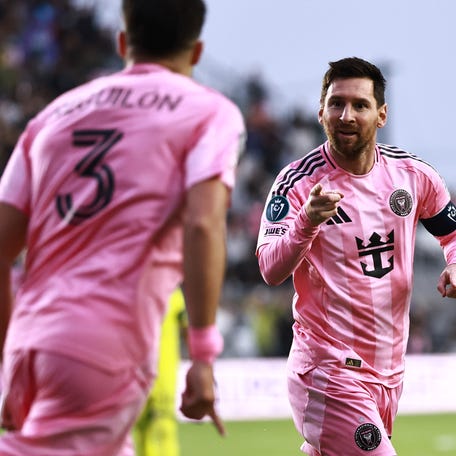 Lionel Messi #10 of Inter Miami CF celebrates after scoring his team's first goal during the CONCACAF Champions Cup Round of 16 Second Leg match between Inter Miami CF and Nashville SC at Chase Stadium on March 18, 2026 in Fort Lauderdale, Florida. This is Lionel MessiÕs 900th career goal.
