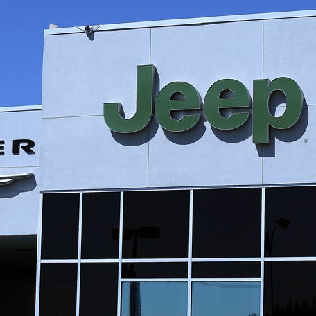 VALLEJO, CA - MAY 02: The Chrysler and Jeep logos are displayed on the exterior of a Chrysler Jeep and Dodge dealership on May 2, 2011 in Vallejo, California. Chrysler reported its first quarterly profit since filing bankruptcy in 2009 earning a profit of $116 million for the first quarter compared to a loss of $197 million one year ago. (Photo by Justin Sullivan/Getty Images)