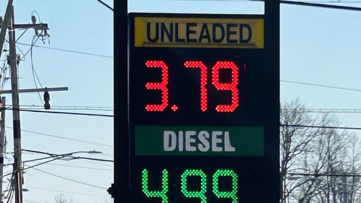 Gas prices shine from a sign on the South Side of Evansville on March 19. Amidst the war in Iran, gas prices in Vanderburgh County have raised by about $1 a gallon, surging 34% in 17 days.