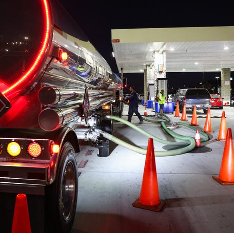 A tanker truck unloads a delivery of gasoline in Hawthorne, California, on March 18, 2026. President Donald Trump's main ally in his war with Iran is Israel, which keeps bombing Iranian oil industry infrastructure, prompting Iran to attack the oil industry in surrounding Middle East countries. That drives up the cost of oil, while shaking America's stock markets.