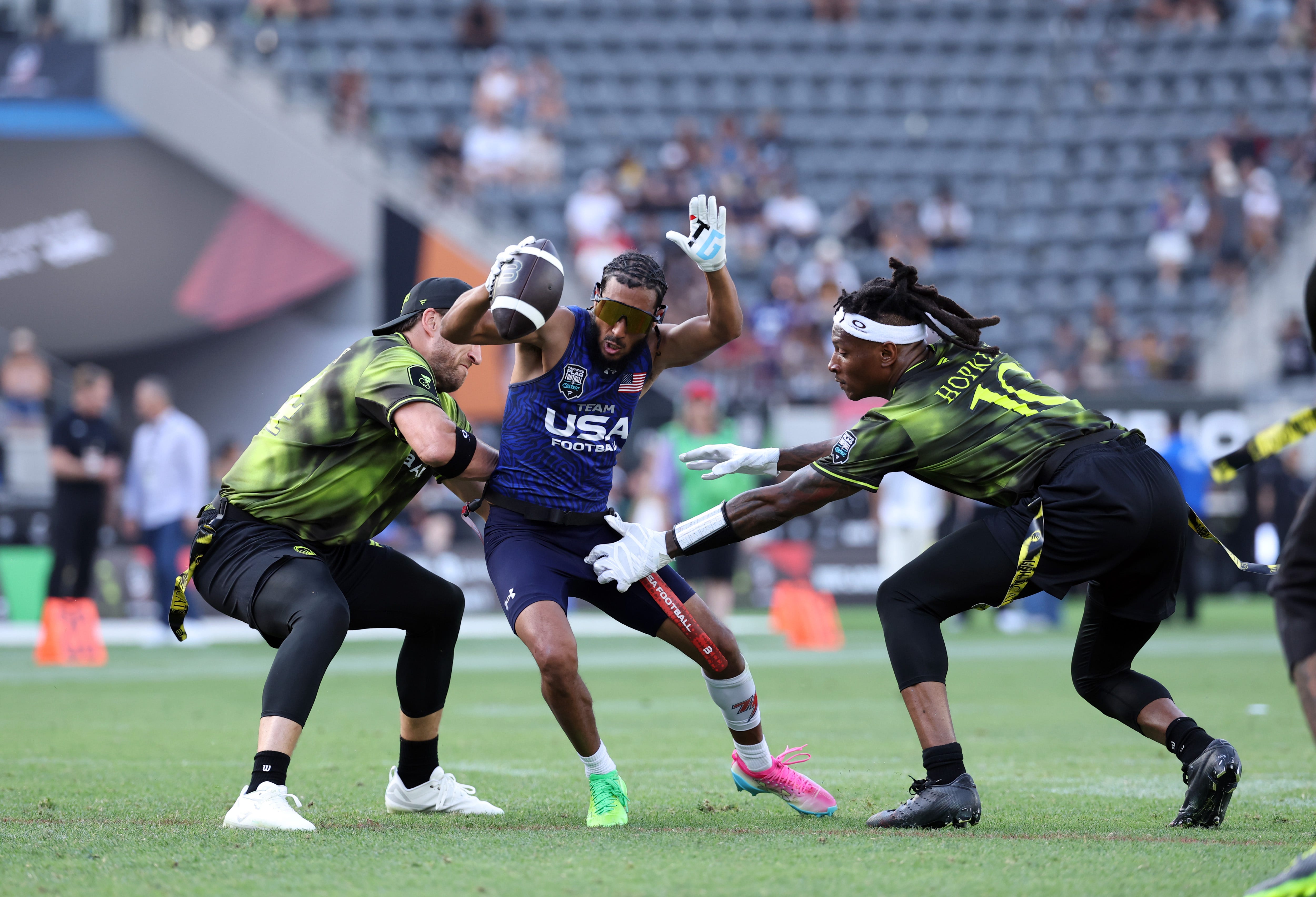 Winners (Team USA) and losers (NFL players) from Fanatics Flag Football Classic