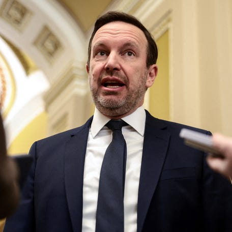 Senator Chris Murphy (D-CT) speaks to the press between votes after the Senate failed to advance proposals that would reduce healthcare costs, on Capitol Hill om December 11, 2025.