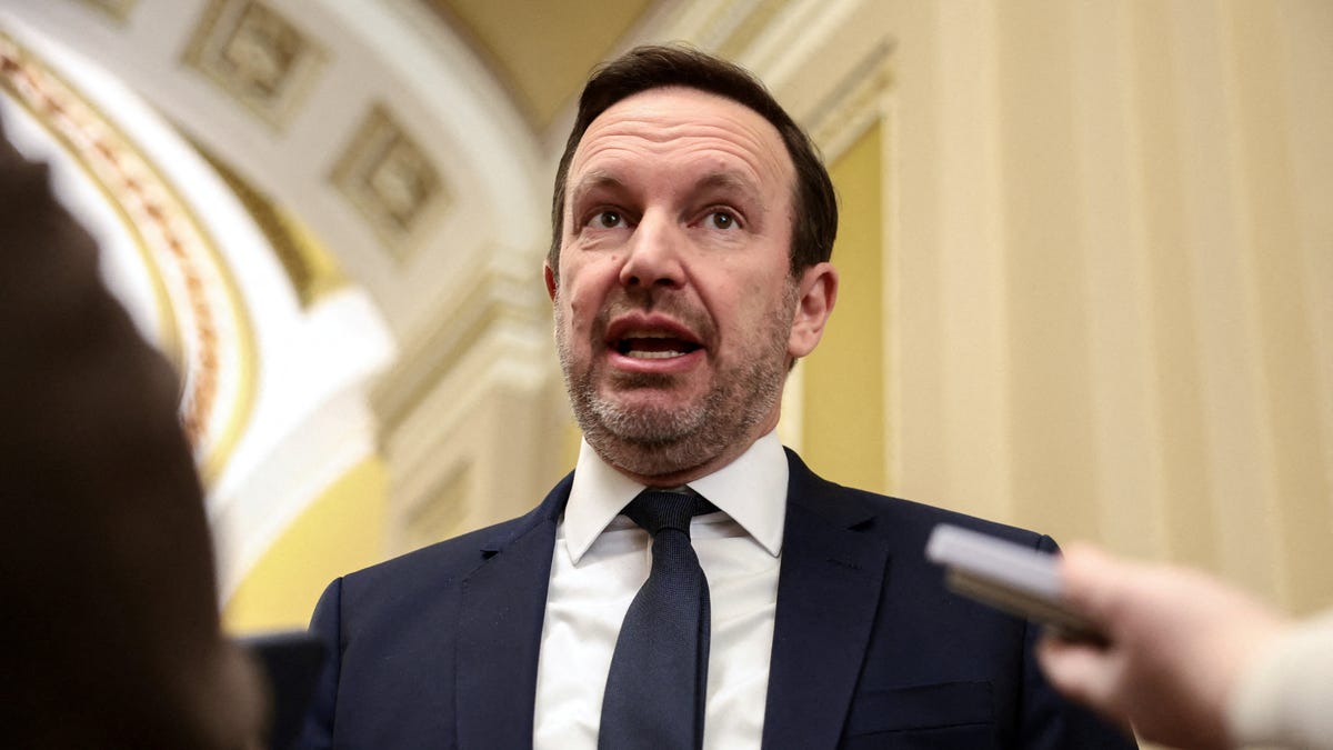 Senator Chris Murphy (D-CT) speaks to the press between votes after the Senate failed to advance proposals that would reduce healthcare costs, on Capitol Hill om December 11, 2025.