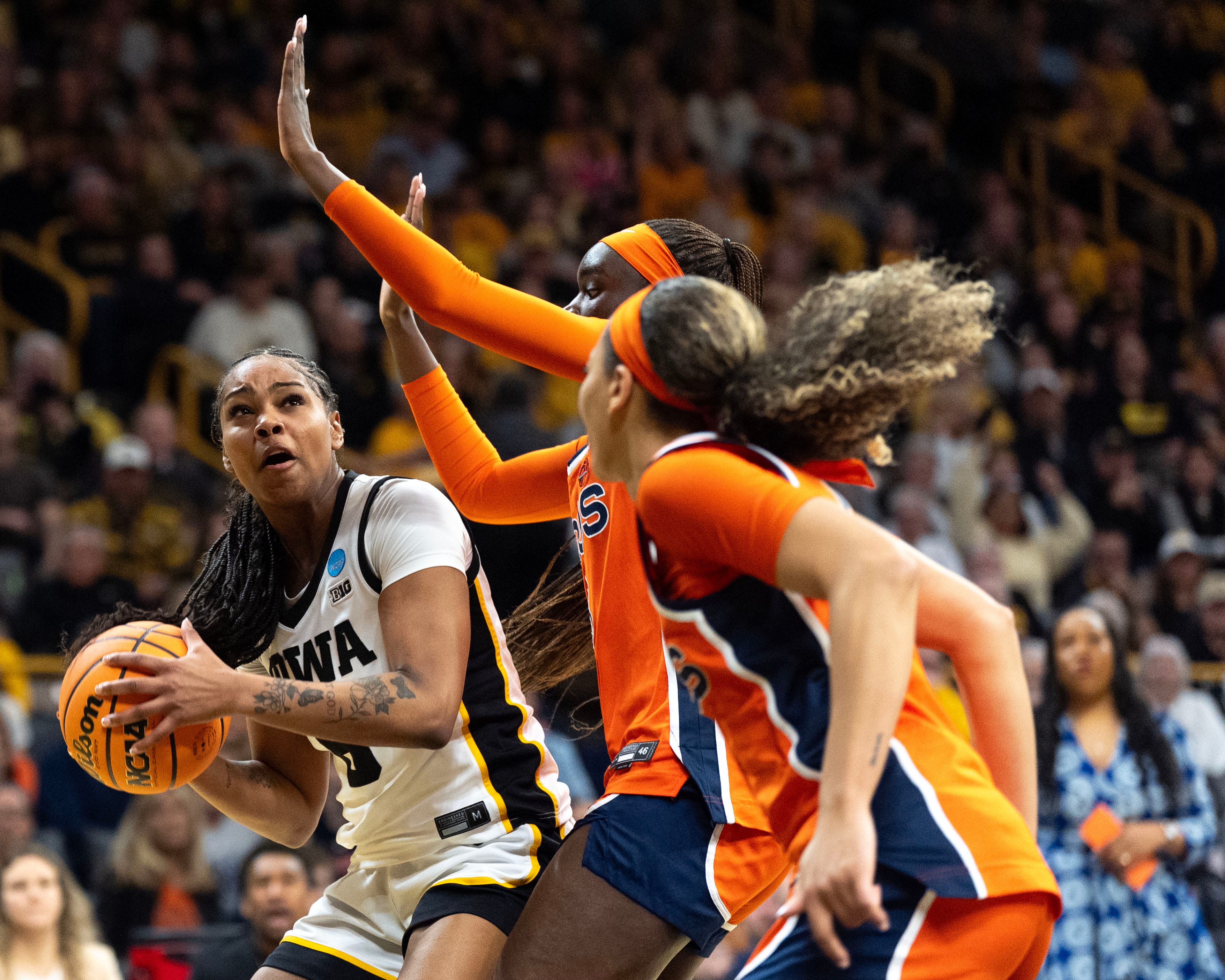 https://www.gannett-cdn.com/authoring/authoring-images/2026/03/23/PIOC/89290171007-20260323-iowa-virginiawomensbasketball-march-madness-0010.jpg?auto=webp&crop=3510,1975,x0,y561&format=pjpg&width=1200
