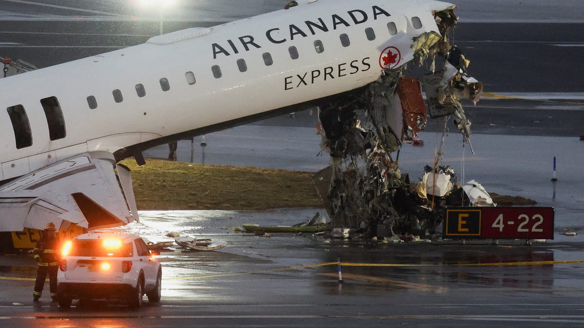 Photos show aftermath of fatal LaGuardia Airport runway crash