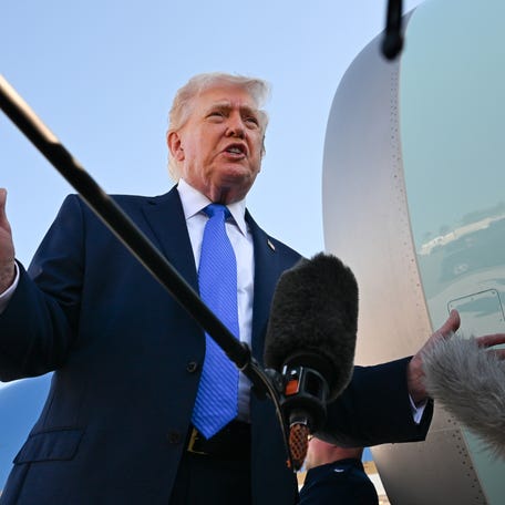 President Donald Trump speaks to reporters before boarding Air Force One at Palm Beach International Airport on March 23, 2026 in West Palm Beach, Florida. President Trump is traveling to Tennessee before returning to Washington.