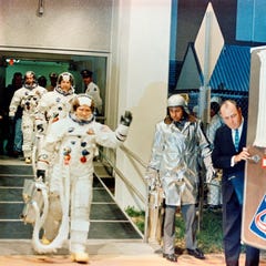 he Apollo 8 crew leaves the Kennedy Space Center's (KSC) Manned Spacecraft Operations Building (MSOB) during the Apollo 8 prelaunch countdown.