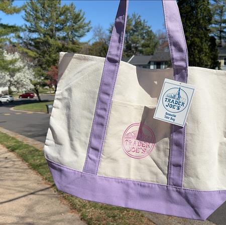 Shoppers lined up and grabbed Trader Joe's new large lavender canvas tote bags, released on March 23, 2026.