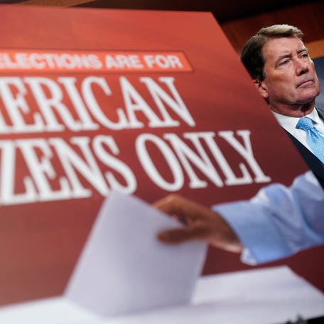 U.S. Senators Bill Hagerty (R-TN) attends a press conference in favor of the proposed "SAVE America Act", which would require proof of U.S. citizenship in registering to vote and a photo ID for casting ballots, at the U.S. Capitol in Washington, D.C., U.S., March 18, 2026. REUTERS/Nathan Howard