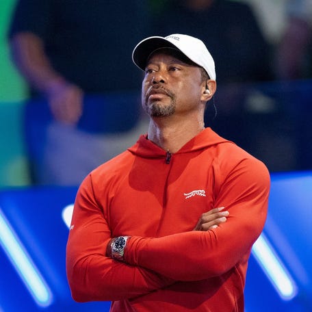 Tiger Woods of Jupiter Links GC watches his team against Boston Common Golf during TGL match at SoFi Center on March 17, 2026, in Palm Beach Gardens, Florida.