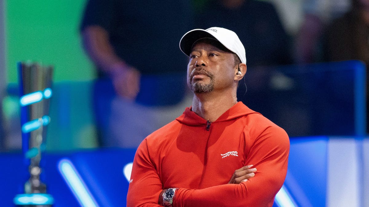 Tiger Woods of Jupiter Links GC watches his team against Boston Common Golf during TGL match at SoFi Center on March 17, 2026, in Palm Beach Gardens, Florida.