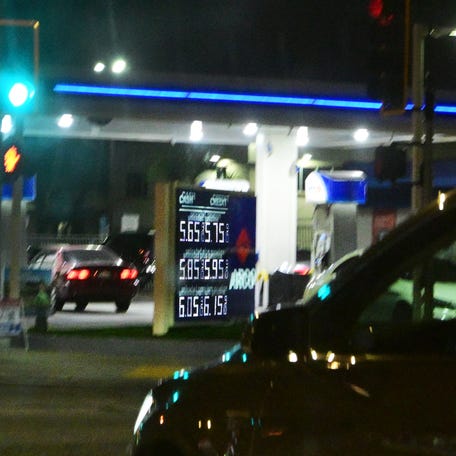 Gas prices are seen at a gas station in Los Angeles, on March 23, 2026.