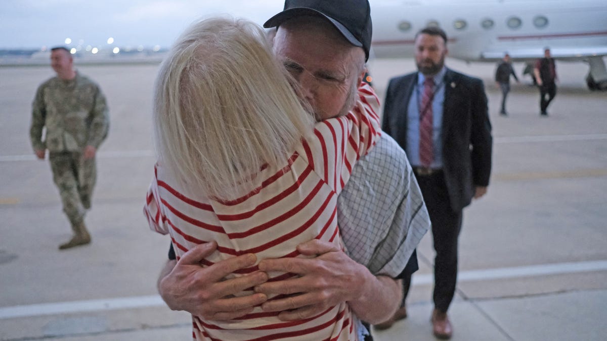 Freed by the Taliban after his family’s plea, Dennis Coyle lands in the U.S. and reunites with loved ones.