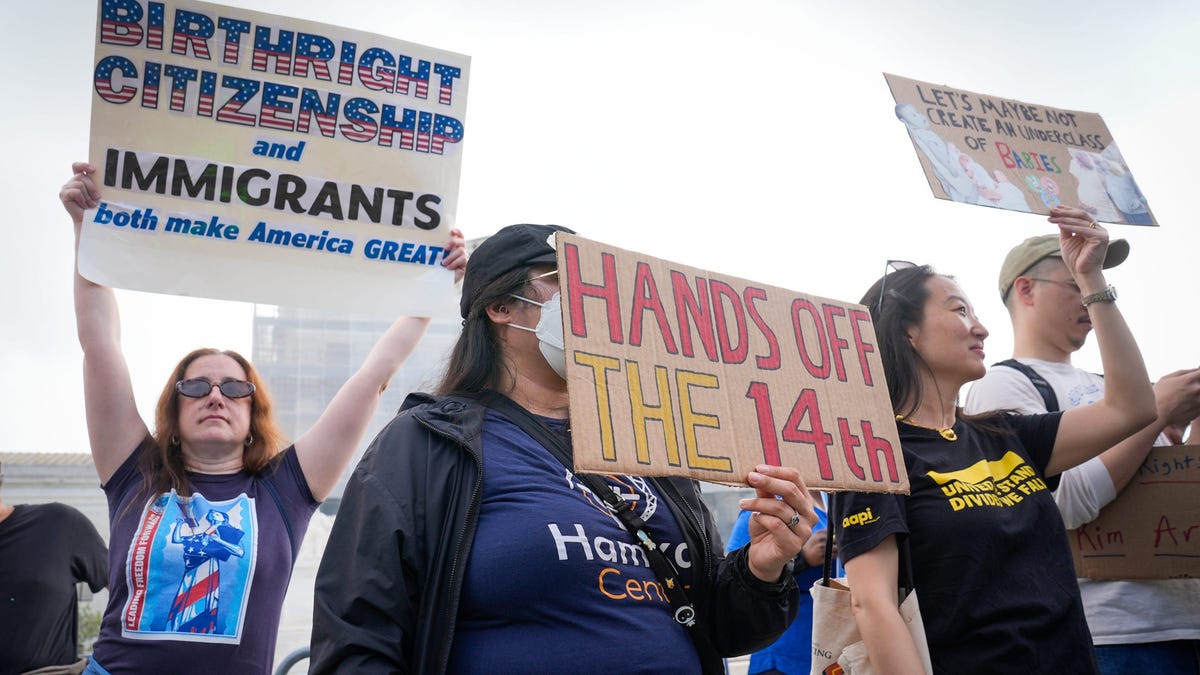 People demonstrated May 15, 2025 outside the Supreme Court before justices heard oral arguments in Trump v. CASA, Inc., a birthright citizenship case.