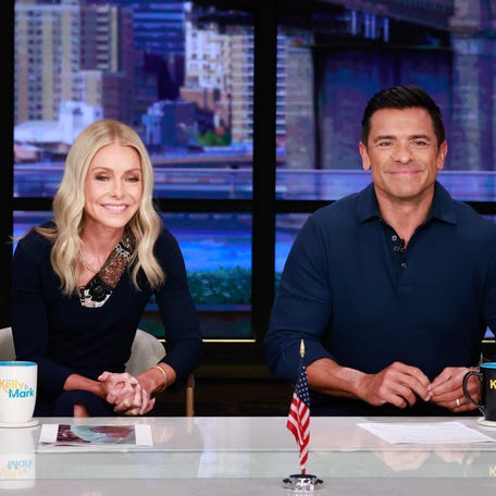 Kelly Ripa, left, and Mark Consuelos appear on 