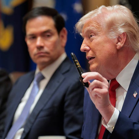 President Donald Trump holds up a Sharpie marker as he speaks during a Cabinet meeting in the Cabinet Room of the White House on March 26, 2026 in Washington, DC.