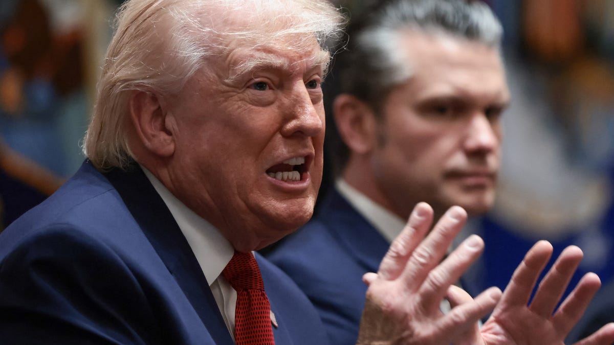 Defense Secretary Pete Hegseth listens to President Donald Trump address a Cabinet meeting at the White House in Washington, DC, on March 26, 2026.