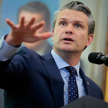 Defense Secretary Pete Hegseth answers questions in the Oval Office at the White House on March 24, 2026, in Washington, DC.