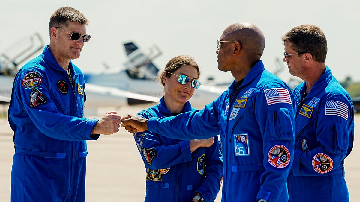 The crew of Artemis II (mission specialists Jeremy Hansen and Christina Koch, Pilot Victor Glover and Commander Reid Wiseman) arrive at Kennedy Space Center, FL March 27, 2026 in advance of their launch on a mission to fly around the moon and back. Craig Bailey, FLORIDA TODAY via USA TODAY NETWORK