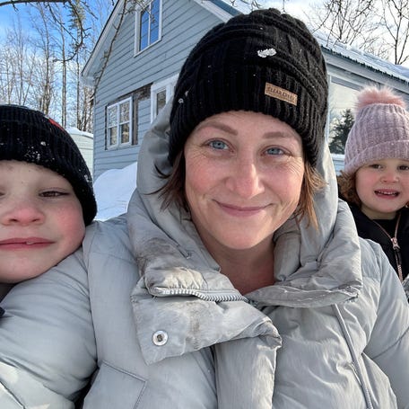 Kasey McBlais, a single mother living in Maine, plays in the snow with her children on Dec. 31, 2025.