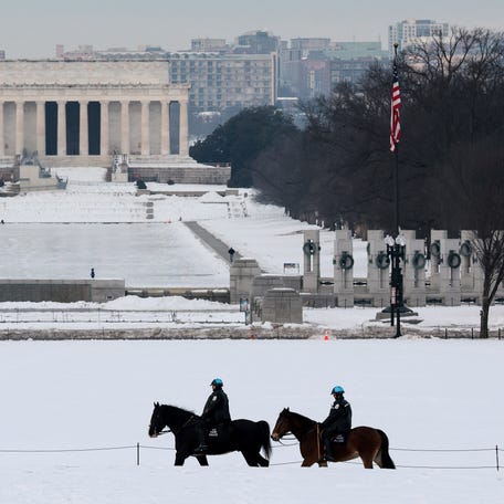 U.S. Park Police mounted officers patrol on their horses on the National Mall near the Lincoln Memorial in Washington, D.C., U.S., February 6, 2026.