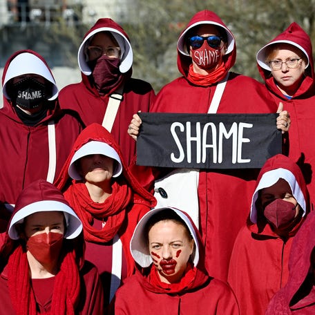 Demonstrators gather at Wasioto Park during a 