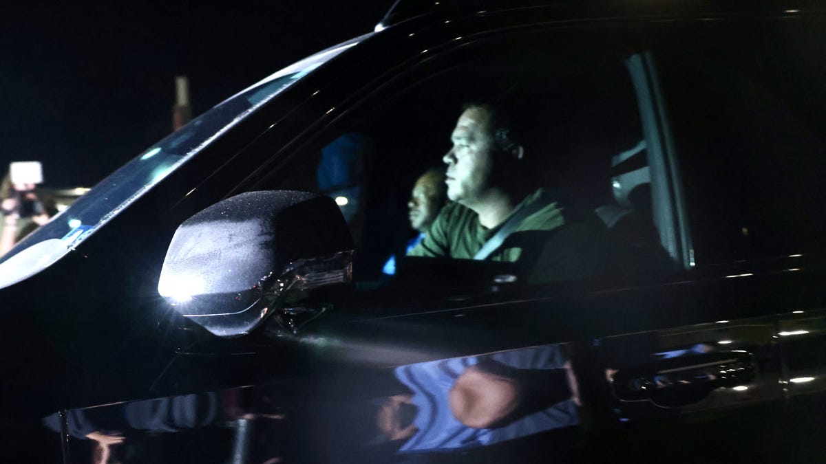 Tiger Woods sits in the passenger seat after leaving the Martin County jail in Stuart, Florida, following his DUI arrest on March 27, 2026.
