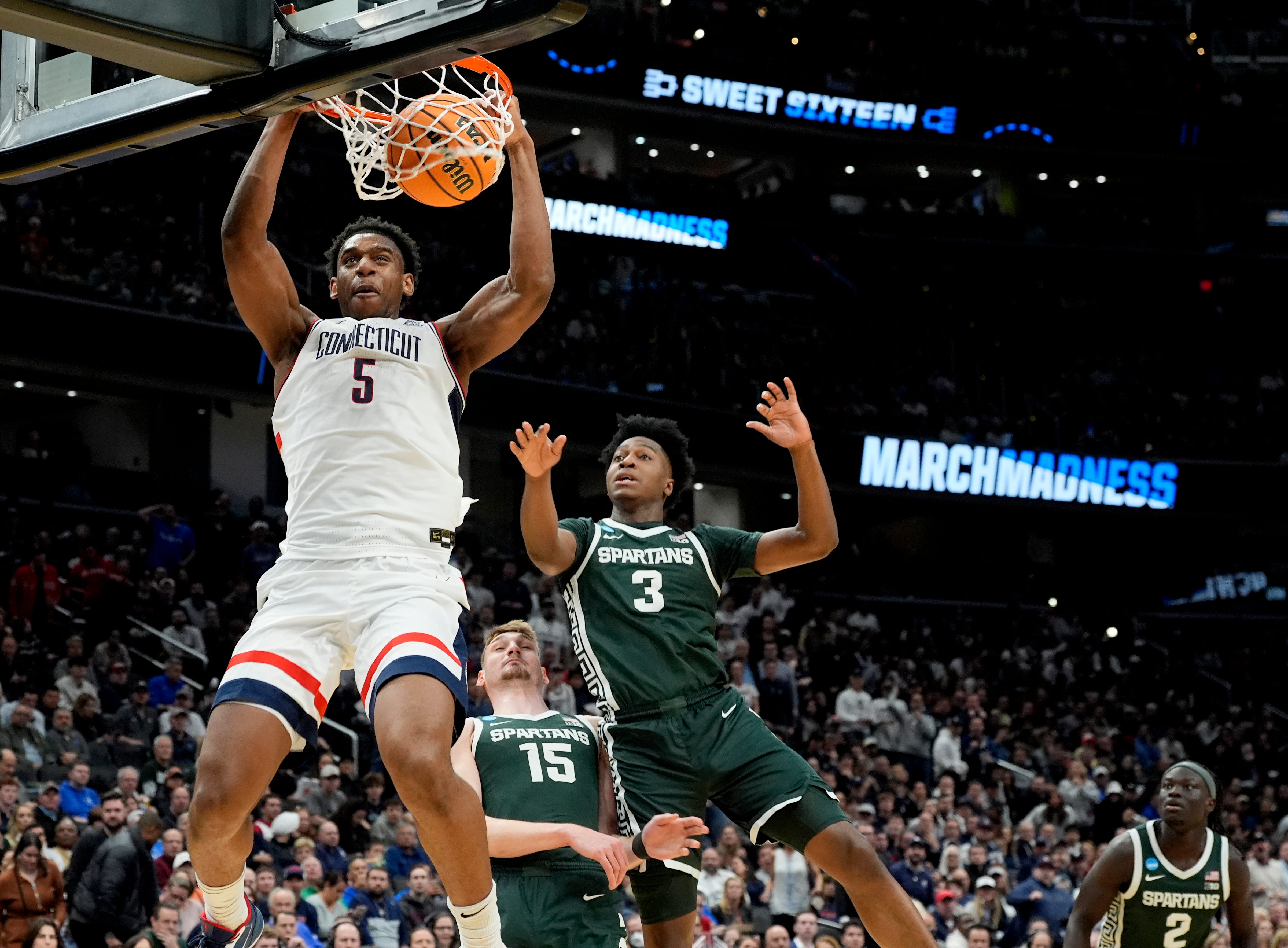 UConn's veteran leaders Alex Karaban, Tarris Reed Jr., and Solo Ball stepped up to secure an NCAA Tournament Sweet 16 win over Michigan State.