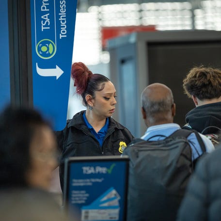 CHICAGO, ILLINOIS - MARCH 27: Travelers enter a line for security screening at O'Hare International Airport on March 27, 2026 in Chicago, Illinois.
