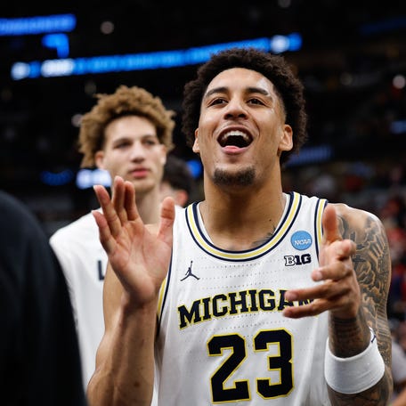 Michigan Wolverines forward Yaxel Lendeborg (23) reacts after defeating the Alabama Crimson Tide in a Sweet Sixteen game of the Midwest Regional of the men's 2026 NCAA Tournament at United Center. Mandatory Credit: Kamil Krzaczynski-Imagn Images