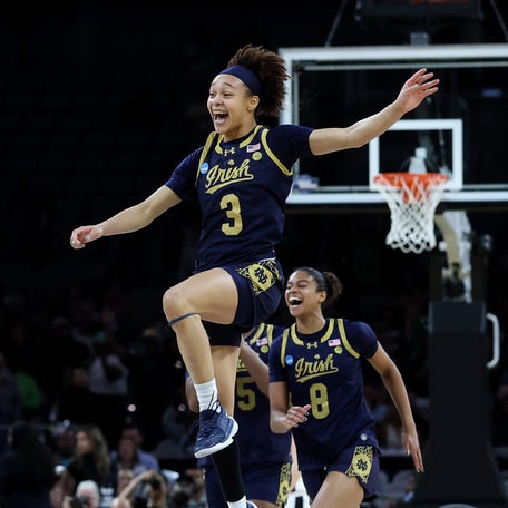 Hannah Hidalgo celebrates Notre Dame's 67-64 victory against Vanderbilt.