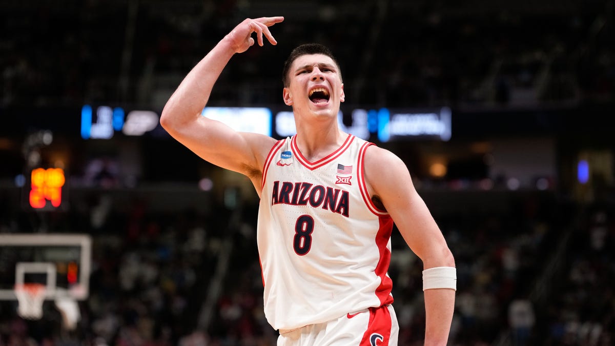 Arizona Wildcats forward Ivan Kharchenkov (8) celebrates in the second half against the Purdue Boilermakers during an Elite Eight game of the West Regional of the men's 2026 NCAA Tournament at SAP Center.