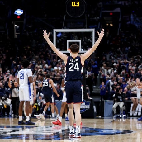 Braylon Mullins #24 of the UConn Huskies celebrates after shooting the game-winning three point basket during the second half of a game against the Duke Blue Devils in the Elite Eight of the 2026 NCAA Men's Basketball Tournament at Capital One Arena on March 29, 2026 in Washington, DC