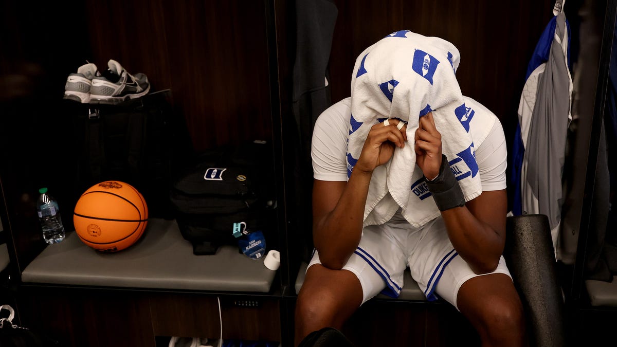 WASHINGTON, DC - MARCH 29: Patrick Ngongba #21 of the Duke Blue Devils looks on in the locker room after being defeated the UConn Huskies 73-72 in the Elite Eight of the 2026 NCAA Men's Basketball Tournament at Capital One Arena on March 29, 2026 in Washington, DC. (Photo by Patrick Smith/Getty Images)