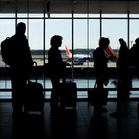 Passengers wait in a TSA security checkpoint queue that stretches through Baltimore/Washington International Thurgood Marshall Airport (BWI) on March 29, 2026.
