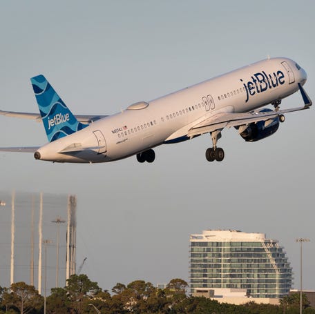 A JetBlue plane takes off at Palm Beach International Airport in West Palm Beach, Florida on February 7, 2025.