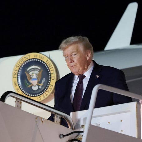 President Donald Trump is pictured disembarking Air Force One at Palm Beach International Airport in West Palm Beach, Florida, on Dec. 20, 2025.