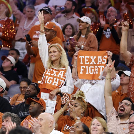 Texas Longhorns fans cheer in the fourth quarter against the Michigan Wolverines in the Elite Eight of the 2026 NCAA Women's Basketball Tournament at Dickies Arena on March 30, 2026 in Fort Worth, Texas.