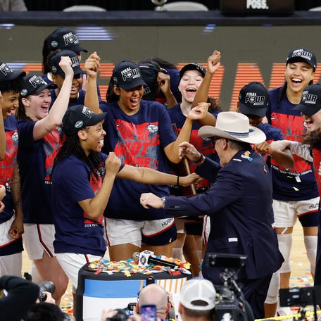 UConn head coach Geno Auriemma has won a dozen titles. He has the budget to do so.