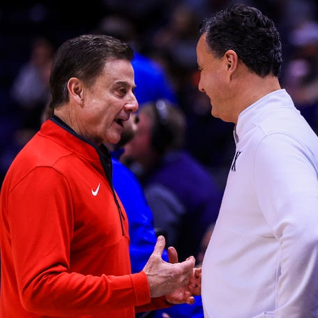 Jan 7, 2025; Cincinnati, Ohio, USA; St. John's Red Storm head coach Rick Pitino talks with Xavier Musketeers head coach Sean Miller before the game at Cintas Center. Mandatory Credit: Katie Stratman-Imagn Images