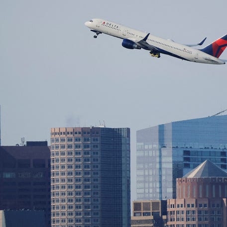 A Delta Airlines flight takes off from Logan International Airport in Boston, Massachusetts, U.S., November 7, 2025.